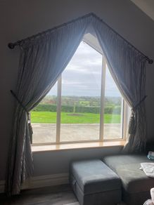 Curtains for triangle window