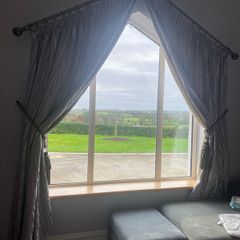 Curtains for triangle window