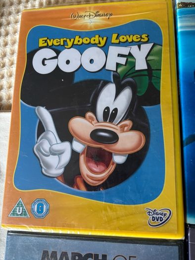 Four DVD's Fantasia (new) Goofy / March if the Penguins  & Nemo.