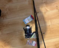 fishing rod and reel read to go sea mackrell pollock rock fishing