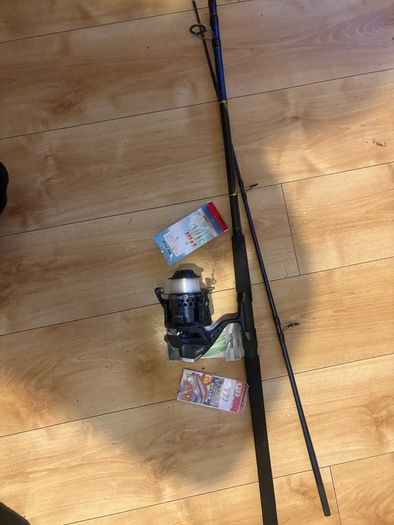 fishing rod and reel read to go sea mackrell pollock rock fishing