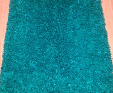 Shag pile teal Rug