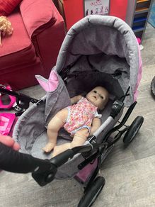 Doll pram and baby