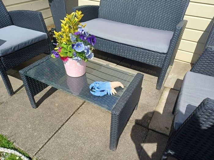 Garden Rattan set. 2 Seater Sofa, 2 Armchairs, 2 Planters, Coffee Table.table