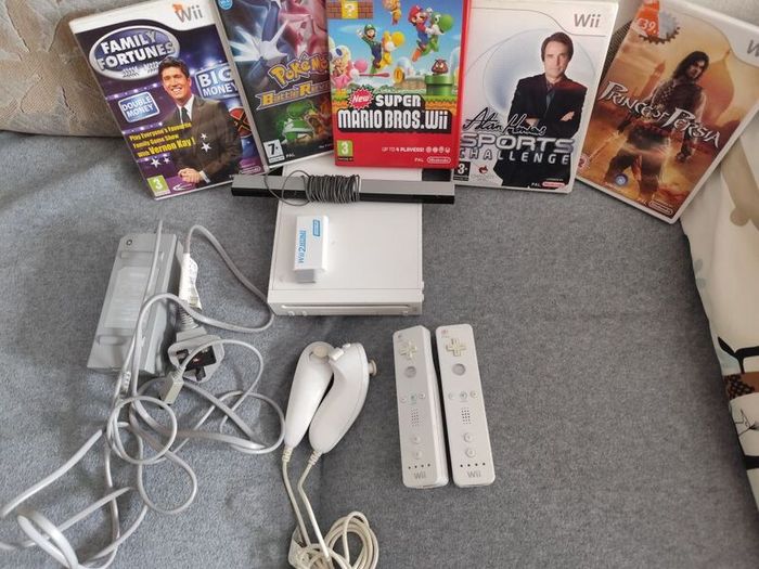 Wii with Mario Bros, Pokemon, Price of Persia