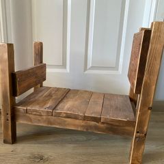 small wooden bed