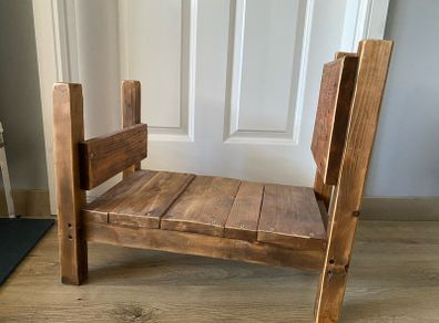 small wooden bed