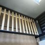 1 Black wooden framed single bed Image 3