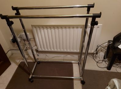 Cloths Rail on wheels, Adjustable and in excellent condition