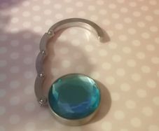 Portable table handbag holder