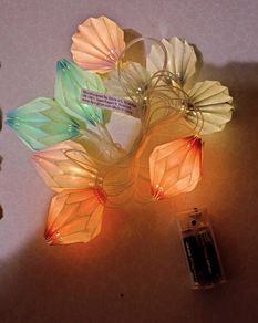 Two Sets Of Paper Lanterns.