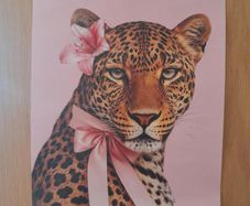 Leopard print wall poster with pink flower and bow
