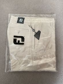 Beige FootJoy golf trousers