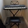 Keyboard with stand and stool Image 4