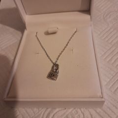 silver chain and pendant