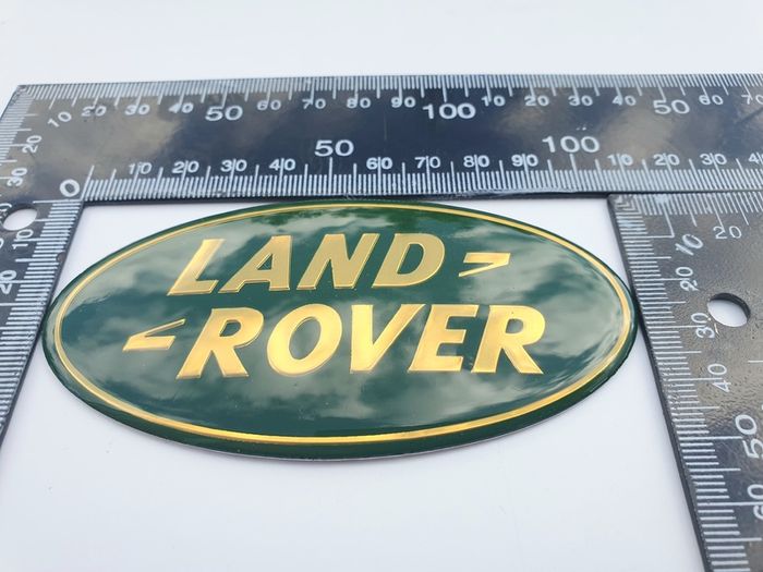 LAND ROVER Defender SVX Green and Yellow (gold) letters GRILL OVAL BADGE 105mm - 53mm 105  53