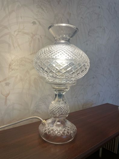Elegant vintage cut glass electric table lamp in a classic hurricane