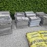 30sq m used 300mm x 600mm paving slabs & paving sand Image 2