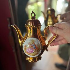 Vintage gold-gilded porcelain coffee set