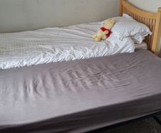 Single bed coverts to double.