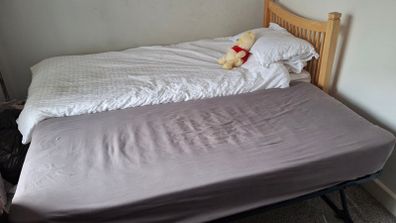 Single bed coverts to double.