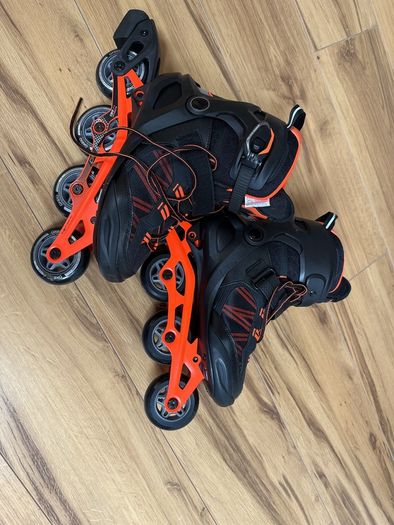 Rollerskates- Acid orange colour- intermediate skill set