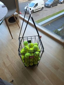 Approx 40 Tennis balls with basket