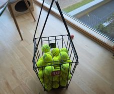 Approx 40 Tennis balls with basket