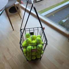 Approx 40 Tennis balls with basket
