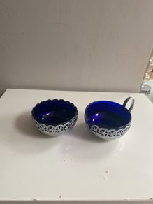 Vintage sugar dish and creamer pierced chrome with blue glass insets