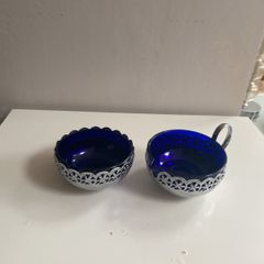 Vintage sugar dish and creamer pierced chrome with blue glass insets
