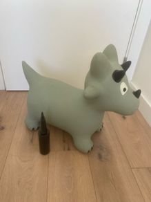 Inflatable jumping dinosaur