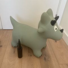 Inflatable jumping dinosaur