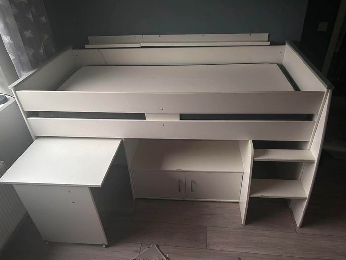 Childrens bed with pull out desk and storage