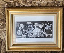 This piece is a ceramic art tile featuring Pablo Picasso's iconic masterpiece, Guernica (1937)