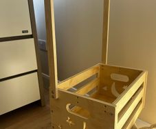 Wooden storage with hanging rail