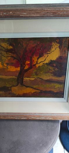 Framed under glass oil panting on board of land scape signed M.M KENNA