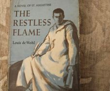 The Restless Flame. A Novel Of St Augustine.  By Louis De Wohl. First Printing 1960 Paperback In Good Condition. See Photos For Same.