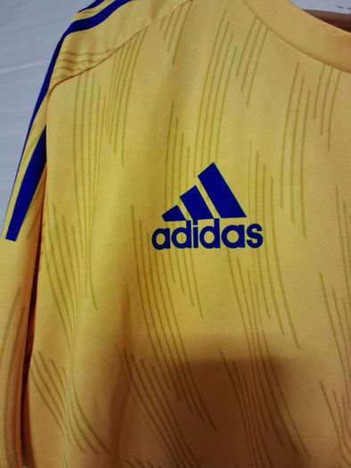 The Hurricanes Jersey. Official Adidas Training / Pre Match Warm Up Jersey Of The Hurricanes Rugby Union Club Wellington New Zealand.