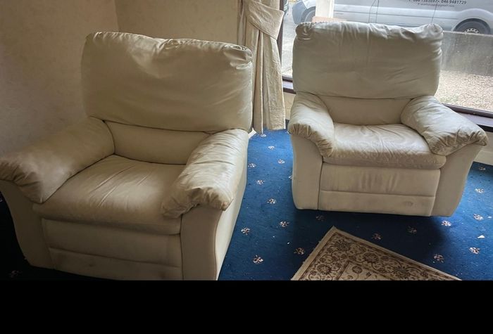 Reclining swivel armchairs