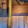 vintage shadow box containing a mix of antique tools, keys, and a loom. Image 8