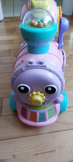 V-Tech pink walker/ride on train