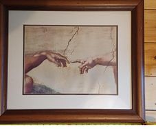 Framed print of Da Vinci's Creation of Adam most famous detail