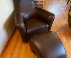 Real leather brown arm chair with foot stool