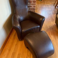 Real leather brown arm chair with foot stool