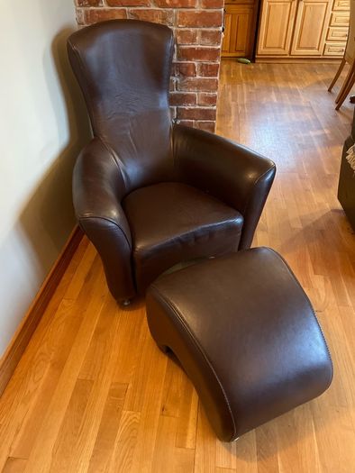 Real leather brown arm chair with foot stool