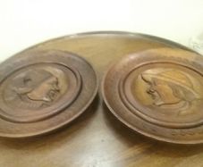 Wooden carved wall plaques
