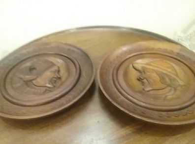 Wooden carved wall plaques
