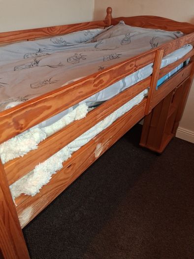 Pine mid-sleeper bed with storage shelf