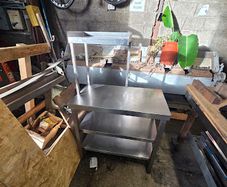 Versatile Table With Overhead Shelf